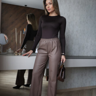 Прямі шкіряні штани на хутрі